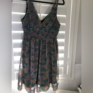 Sheer Lined Floral Mini Dress by Johnny Martin.